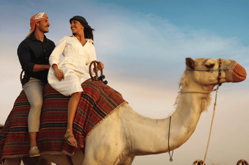 Camel Ride Through The Dunes